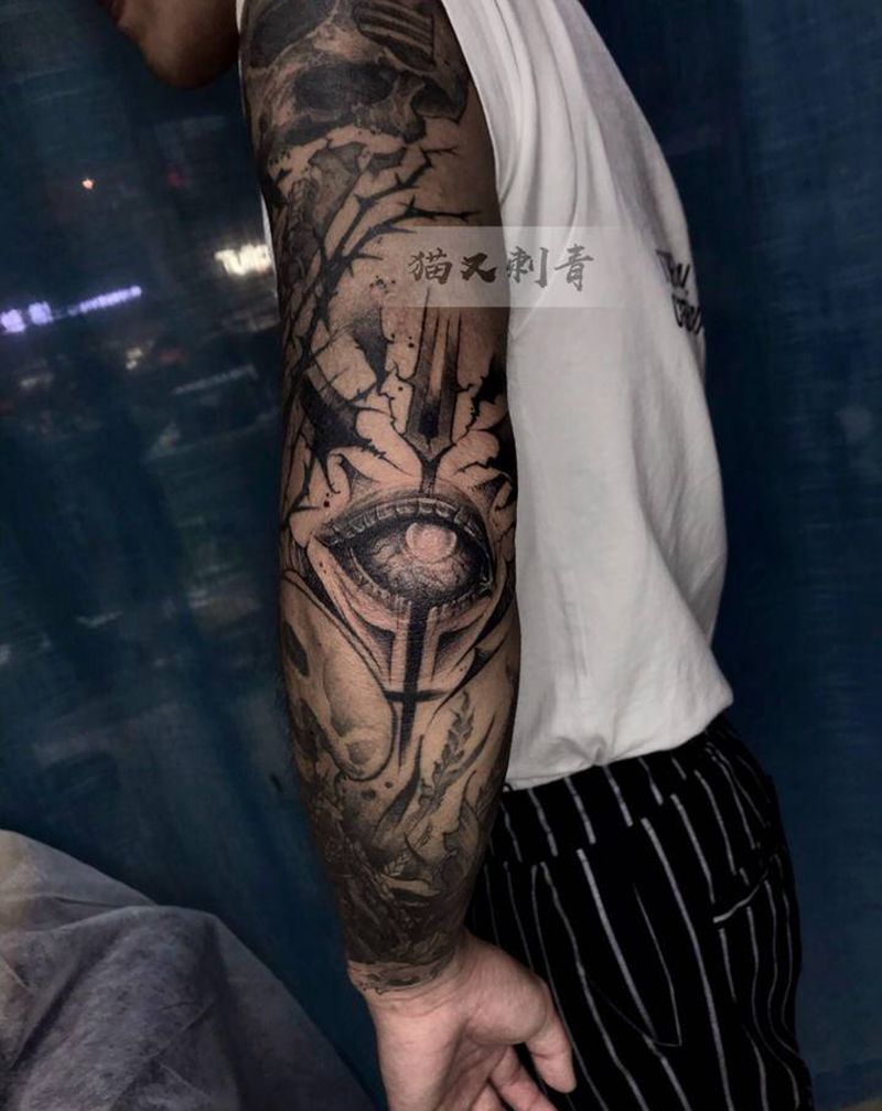 设计图恶魔之眼纹身图片_手臂点刺纹身图案