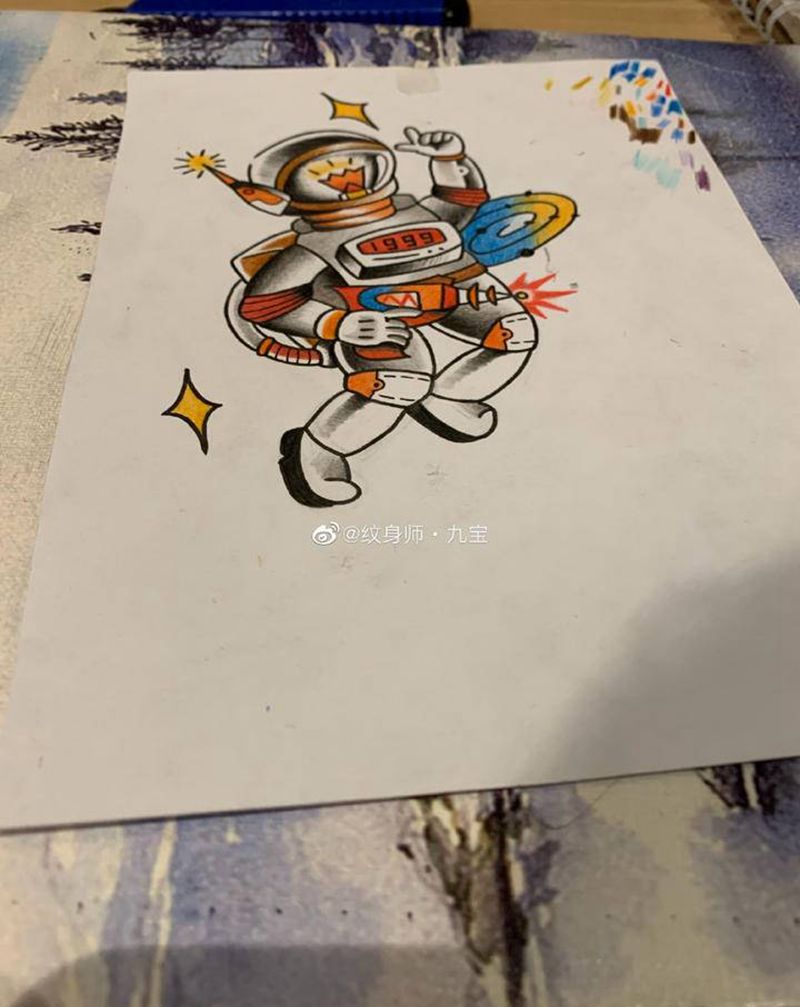 手可摘星辰的宇航员纹身图片_手臂手部Old School老传统宇航员纹身图案