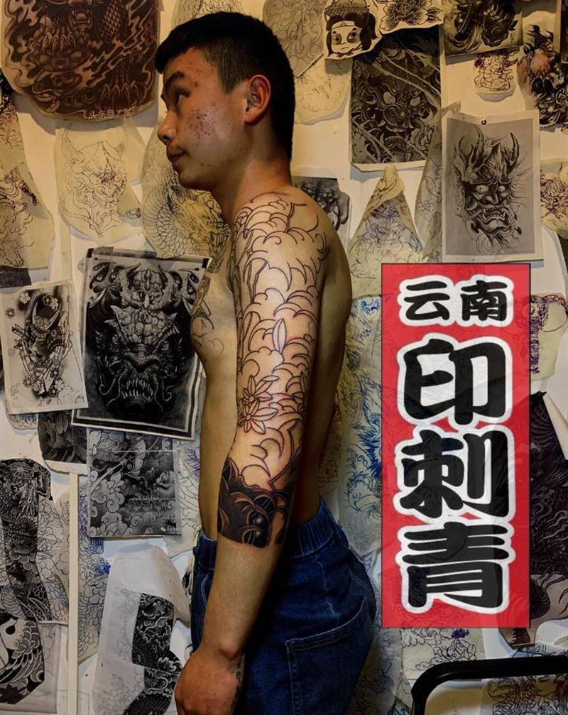 手绘浪臂纹身图片_手臂老传统纹身图案