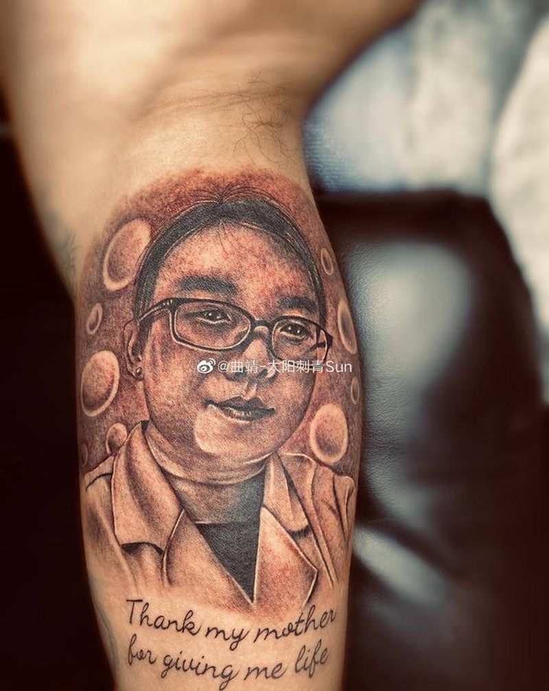 肖像纹身图片_手臂纹身图案