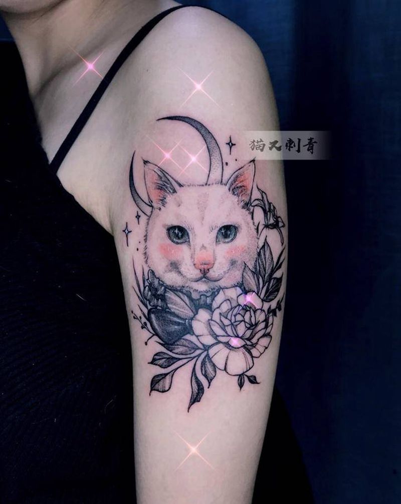 客人的猫纹身图片_手臂点刺纹身图案