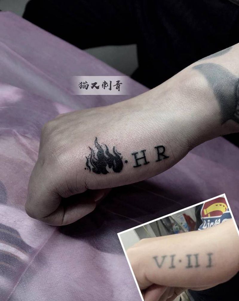 一个小遮盖修改纹身图片_手部纹身图案