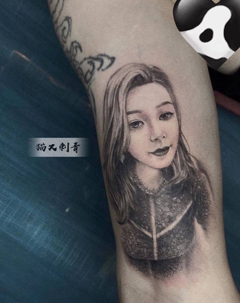 小像纹身图片_手臂欧美写实纹身图案