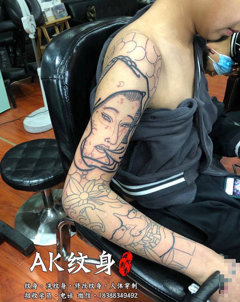 生首般若花臂纹身图片_手臂老传统新传统纹身图案