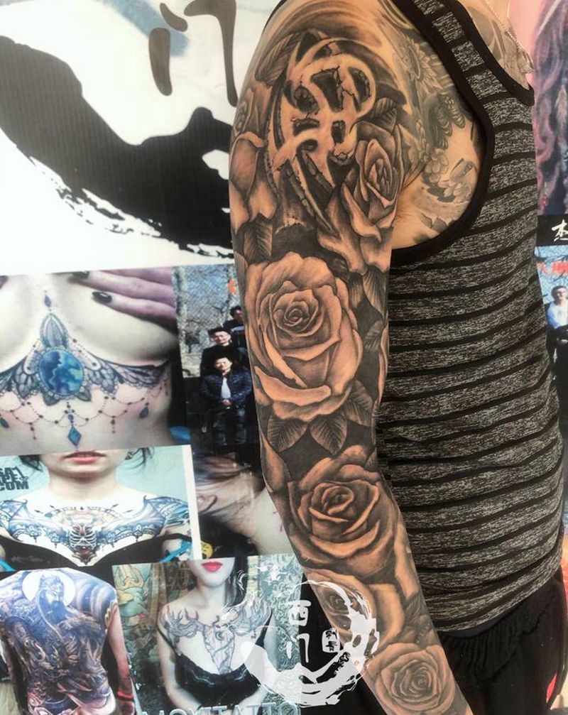 玫瑰花臂纹身图片_手臂欧美写实纹身图案