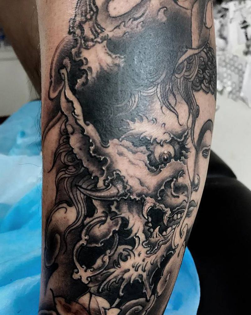 佛,魔纹身图片_腿部脚部新传统老传统佛魔一念之间纹身图案