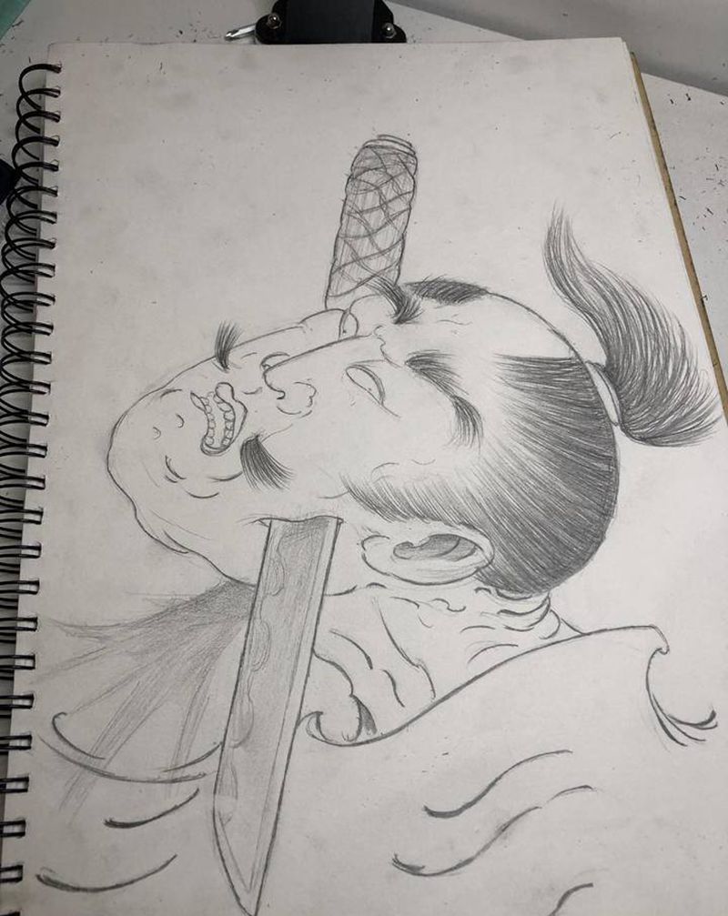 生首纹身图片_腿部纹身图案