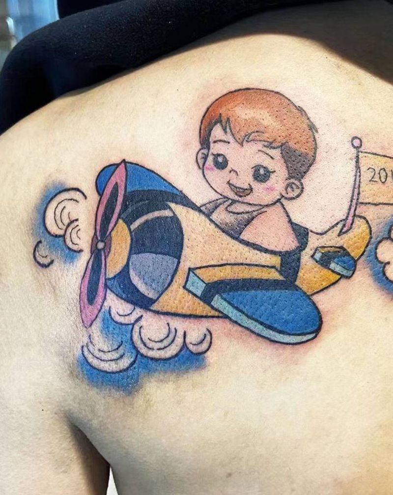 快乐童年纹身图片_背部纹身图案