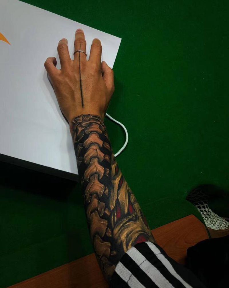 骨头纹身图片_手臂欧美写实纹身图案