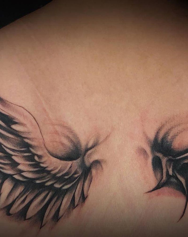 翅膀纹身图片_背部欧美写实纹身图案