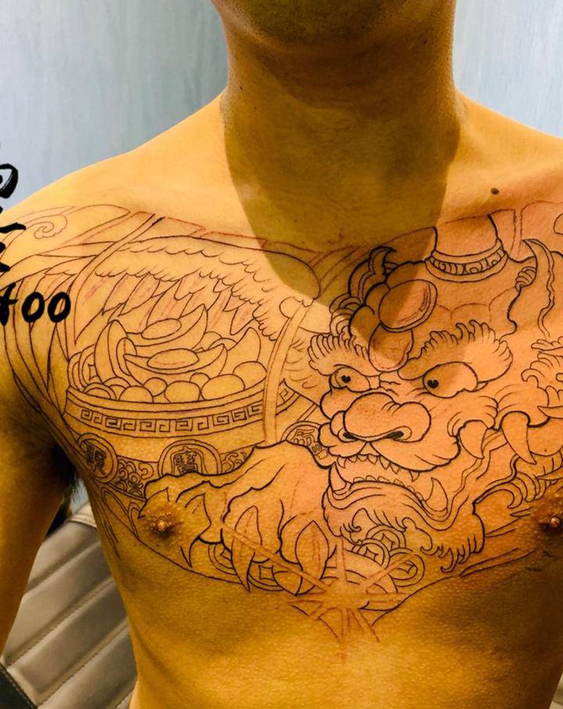 大湿子纹身图片_胸部纹身图案