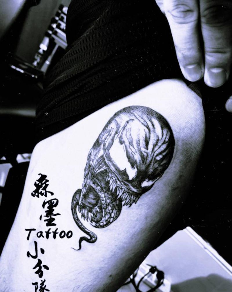 毒液纹身图片_腿部纹身图案