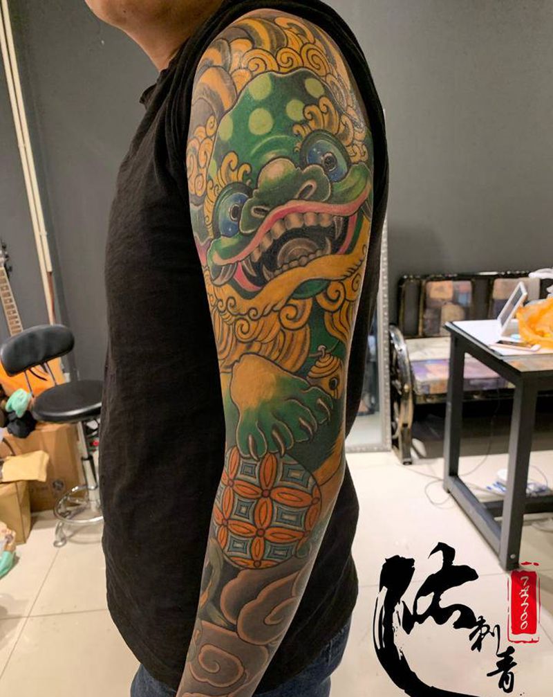 唐狮纹身图片_手臂新传统纹身图案