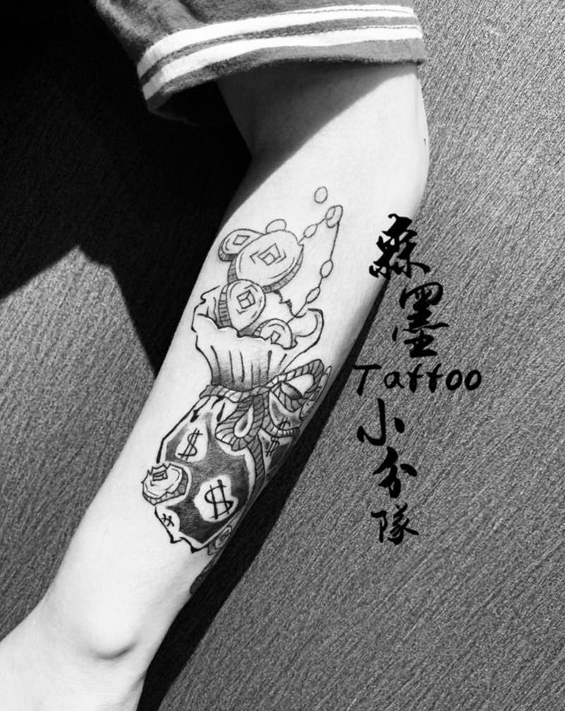 一夜暴富纹身图片_手臂纹身图案