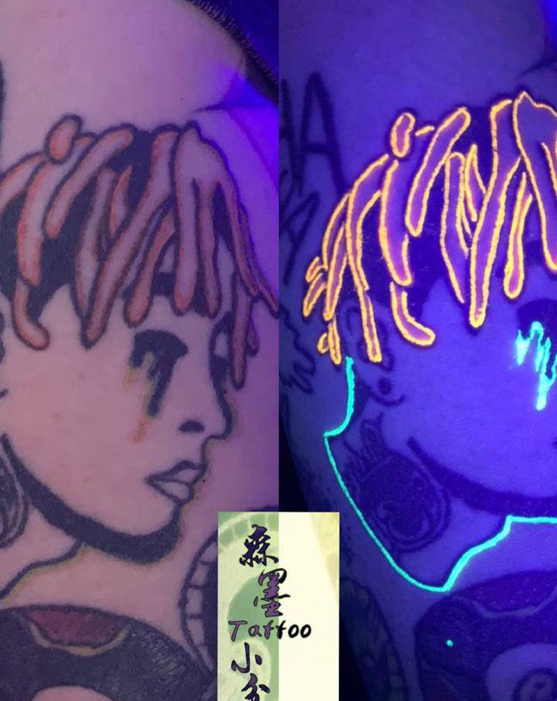 荧光纹身图片_手臂纹身图案