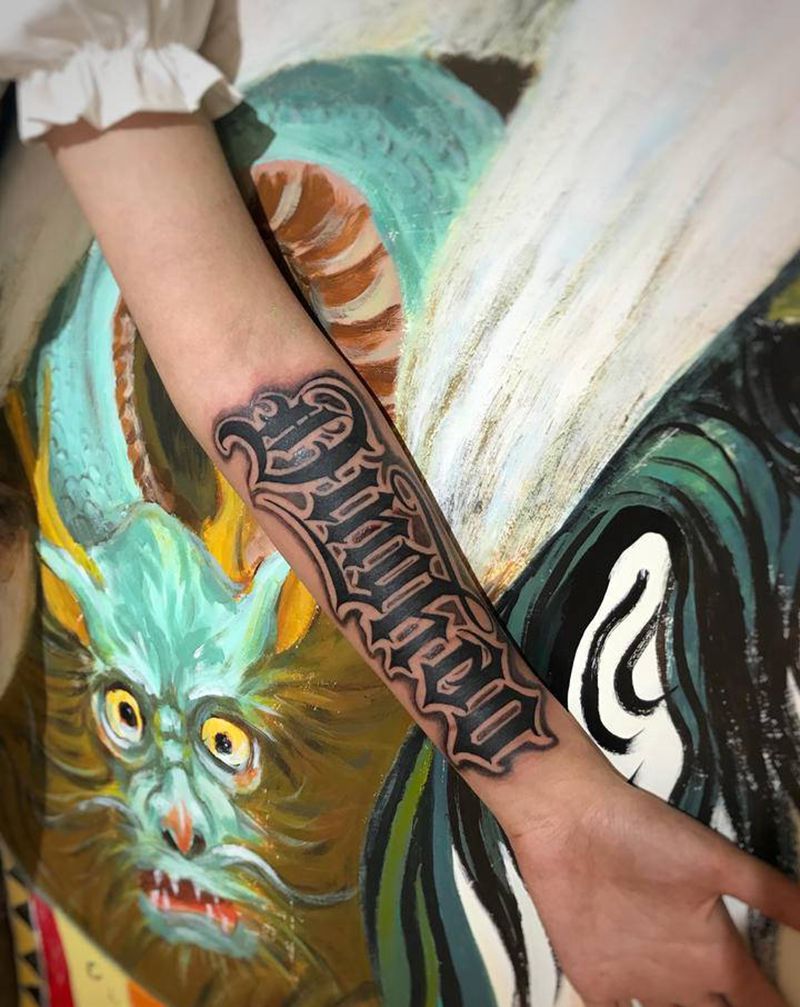 花体字纹身图片_手臂花体字纹身图案