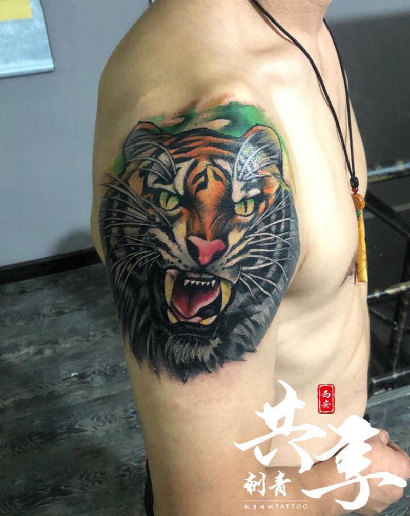客人属相老虎纹身图片_手臂欧美写实纹身图案