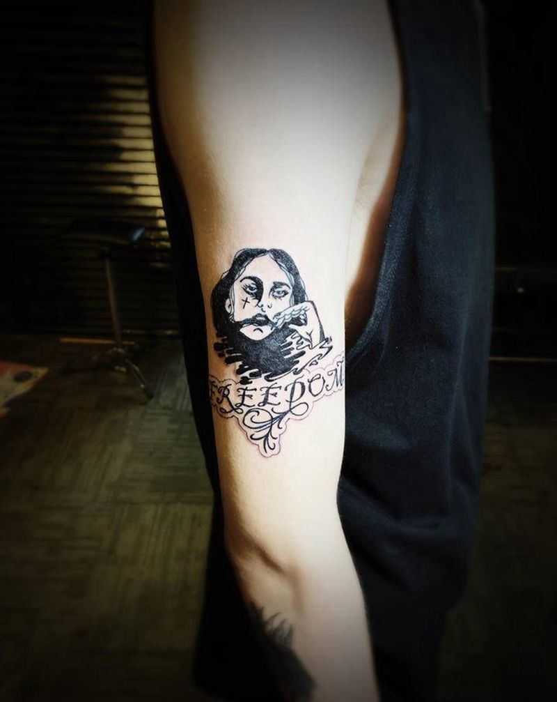 丧纹身图片_手臂花体字图腾纹身图案