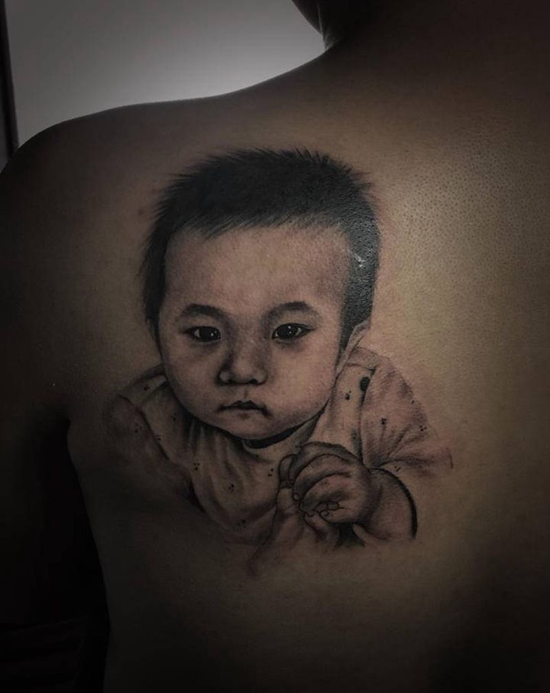 写实肖像纹身图片_背部欧美写实纹身图案