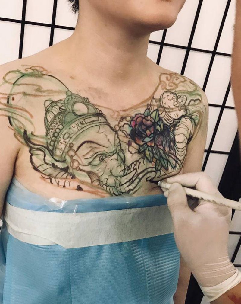 象神花胸纹身图片_胸部新传统象神纹身图案