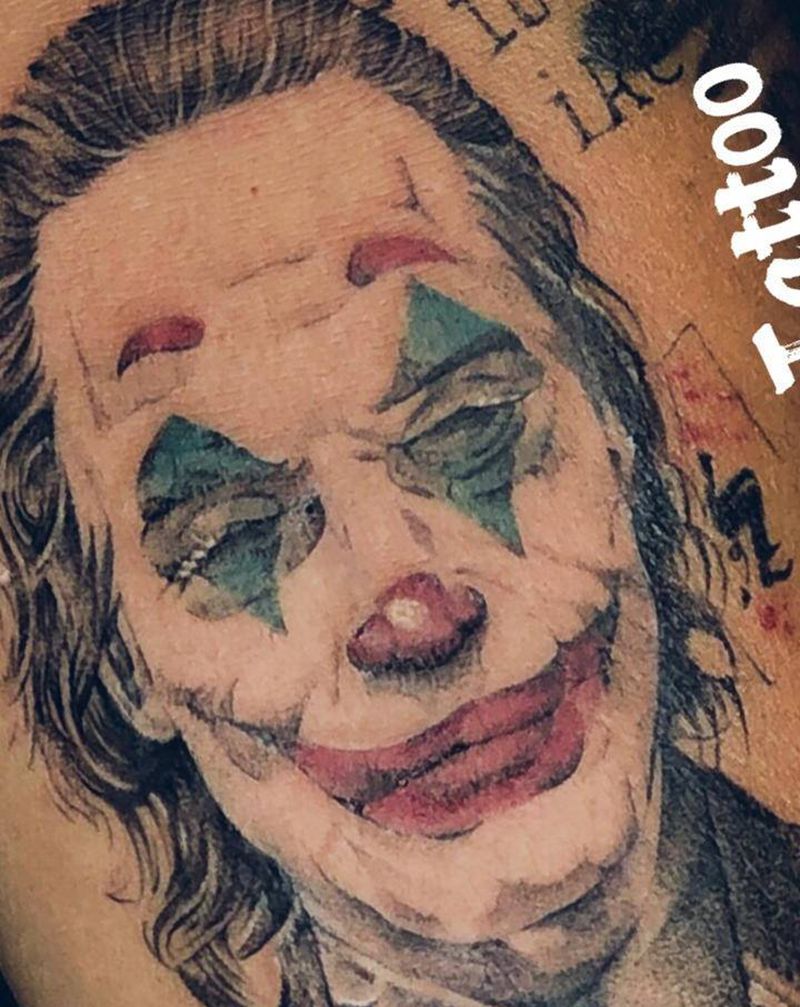 小丑纹身纹身图片_手臂手部欧美写实彩色写实纹身图案