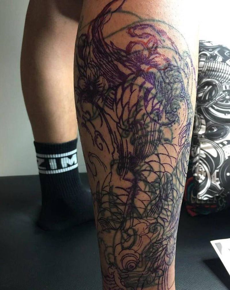 锦鲤遮盖纹身图片_腿部纹身图案
