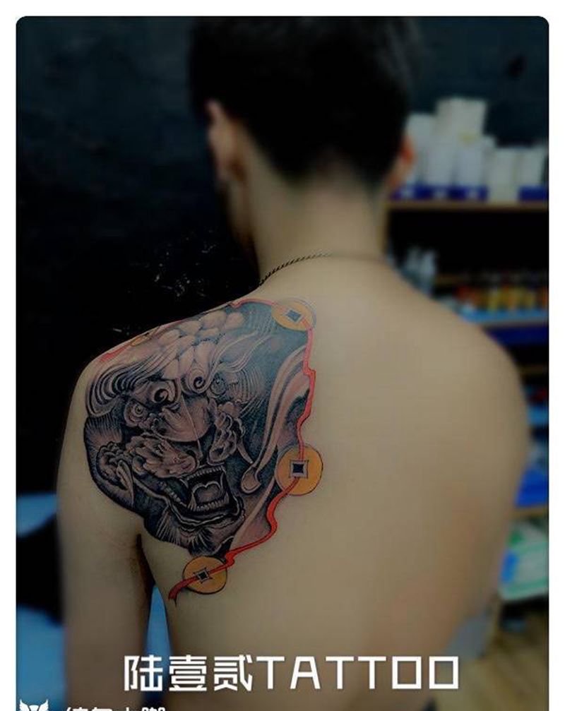 唐狮子纹身图片_背部新传统纹身图案
