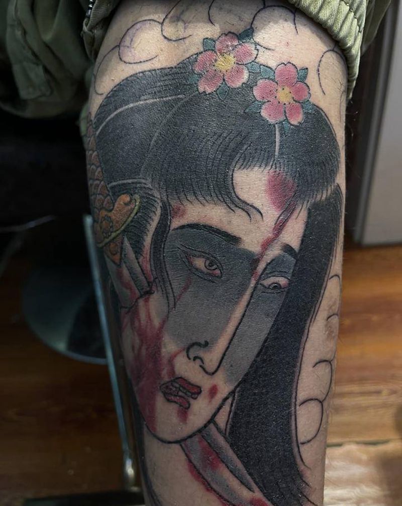 生首纹身图片_腿部老传统生首纹身图案