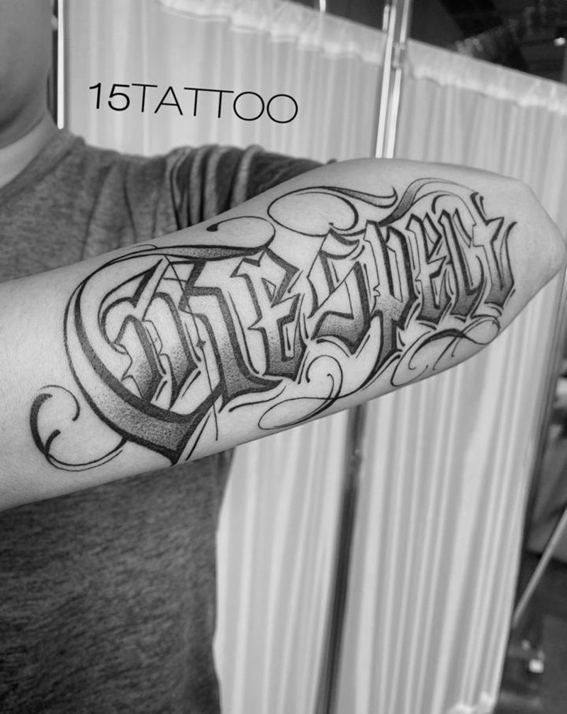 花体字纹身图片_手臂花体字纹身图案