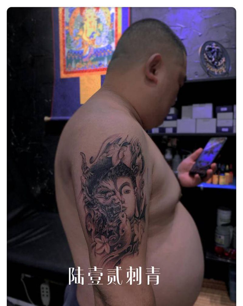 一念成佛一念成魔纹身图片_手臂新传统纹身图案