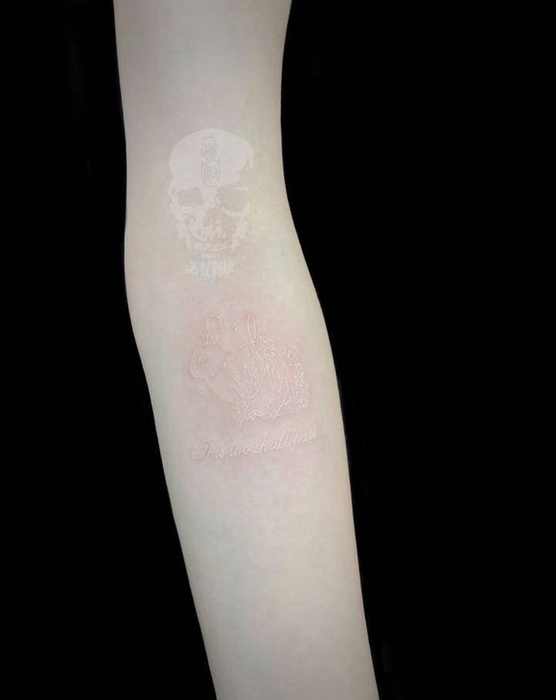 白色纹身兔子纹身图片_手臂白色艺奴刺域纹身图案