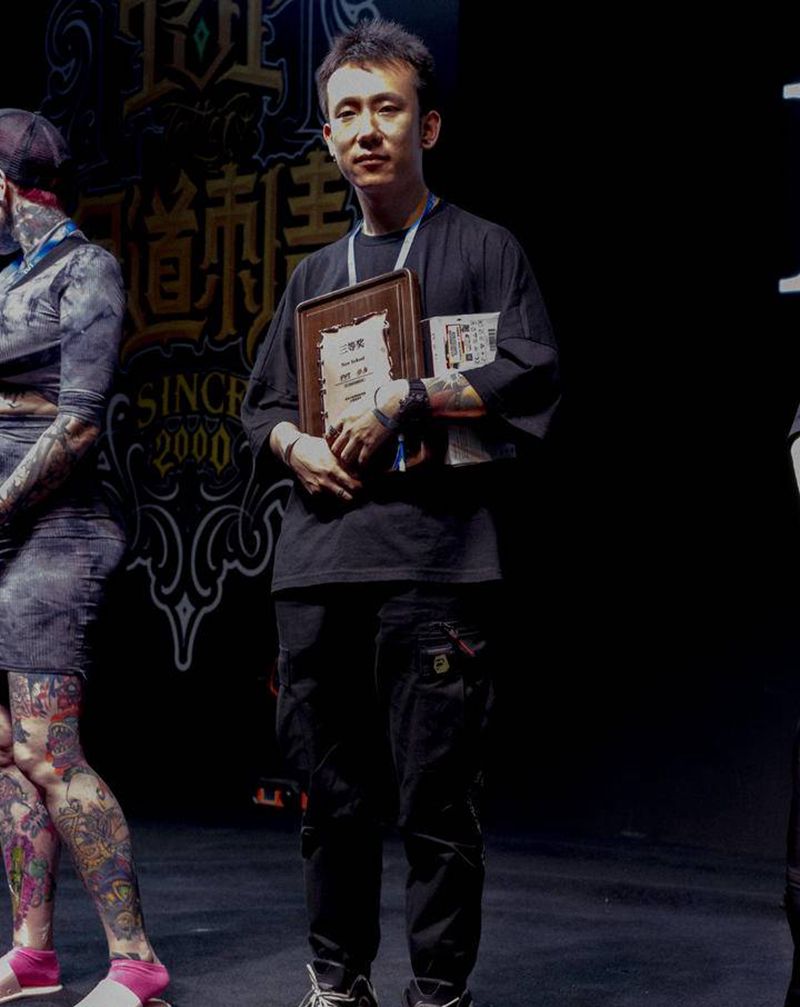 大唐国际纹身展领奖纹身图片_腿部New School纹身图案