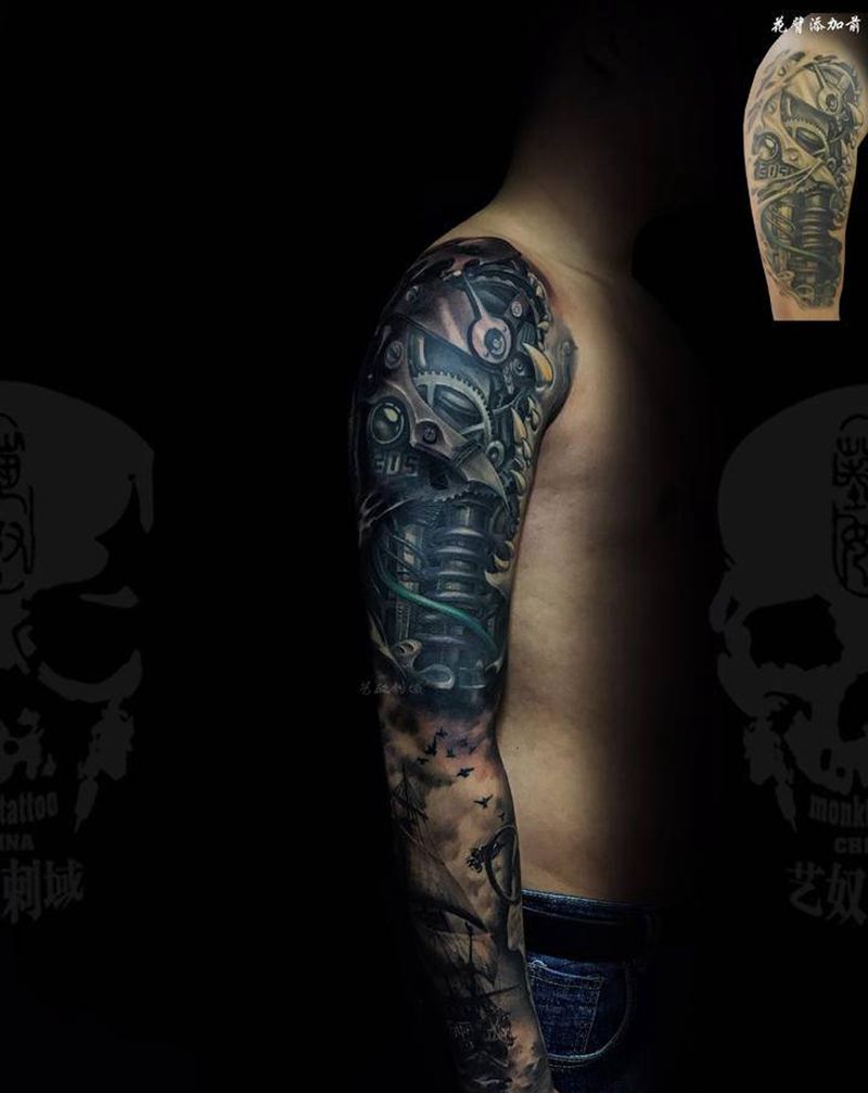 花臂纹身图片_手臂欧美写实艺奴刺域纹身图案