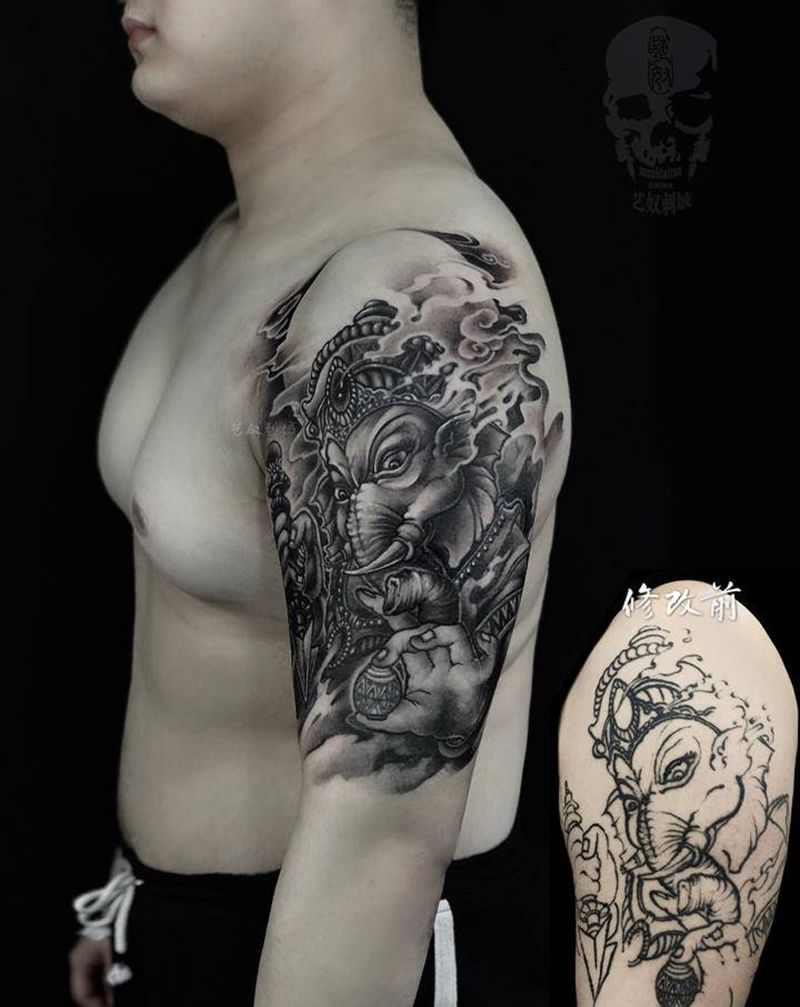 大臂象神修改纹身图片_手臂新传统纹身图案