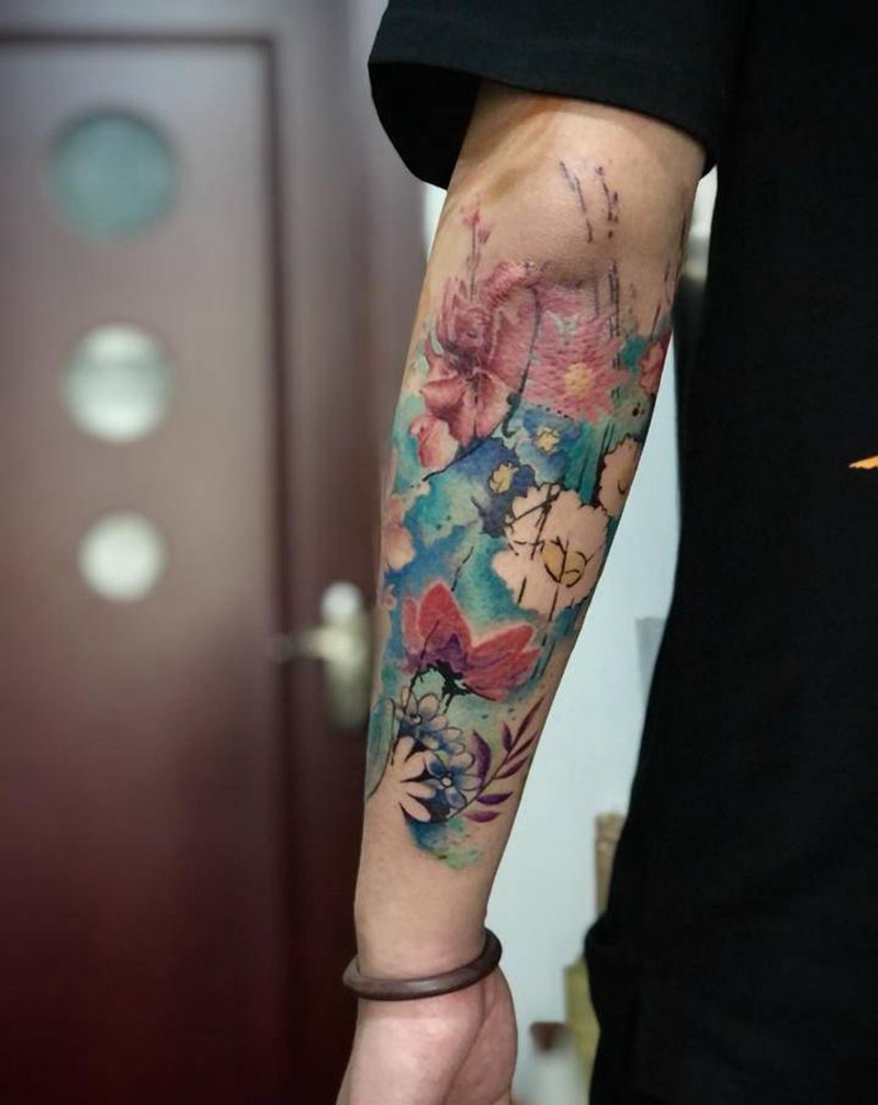 花纹身图片_手臂水彩纹身图案