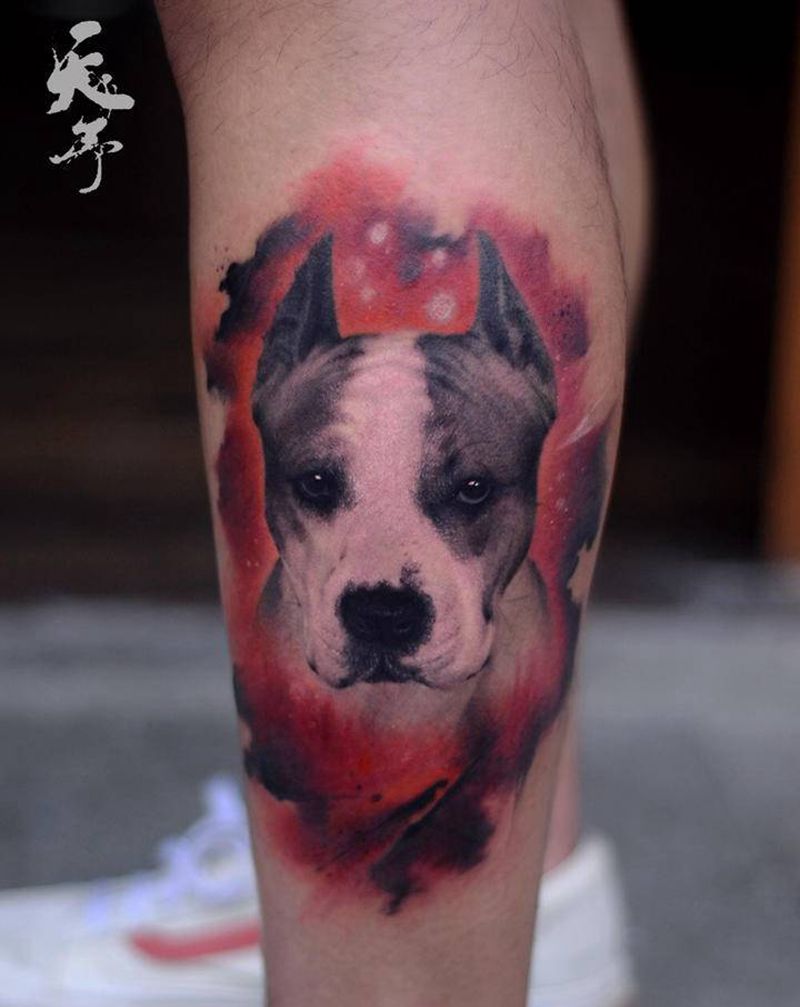 西安天予刺青写实作品纹身图片_腿部欧美写实小狗纹身图案