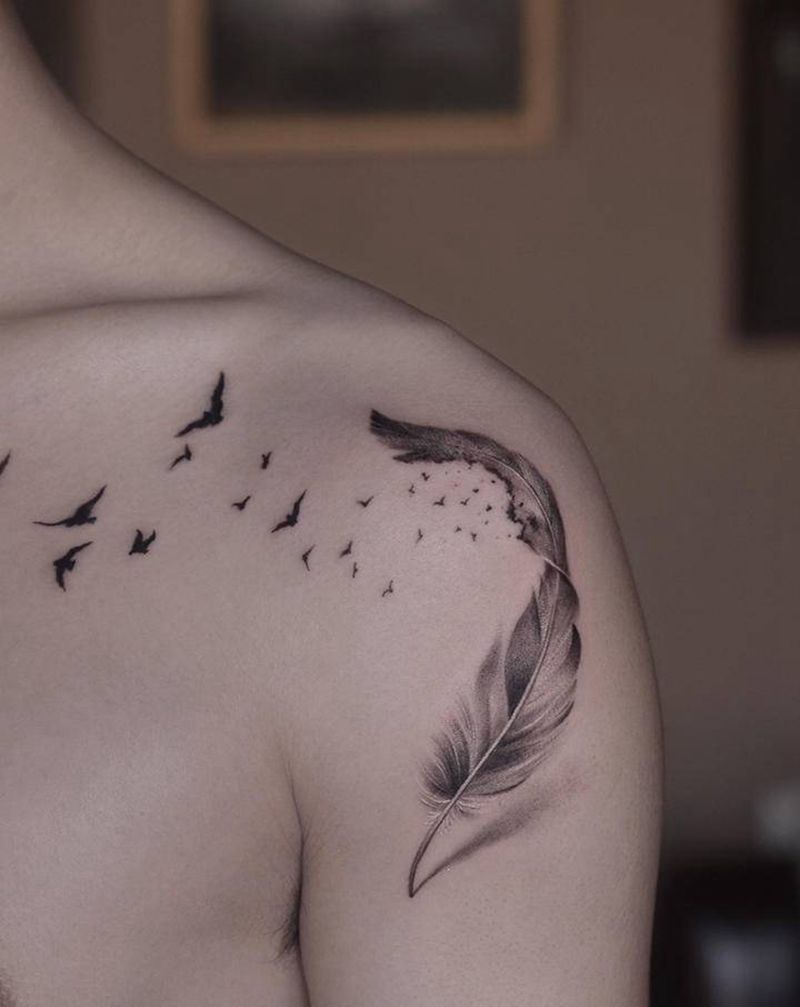 羽毛纹身图片_肩部胸部纹身图案