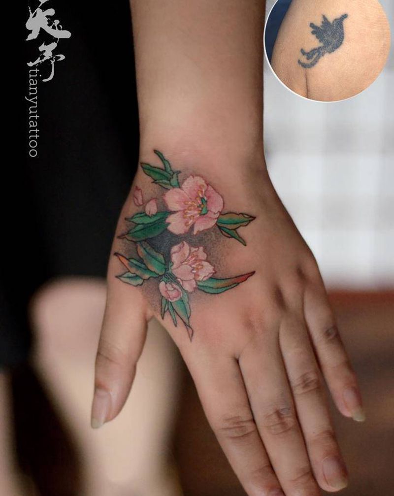 纹身遮盖纹身图片_手背纹身图案