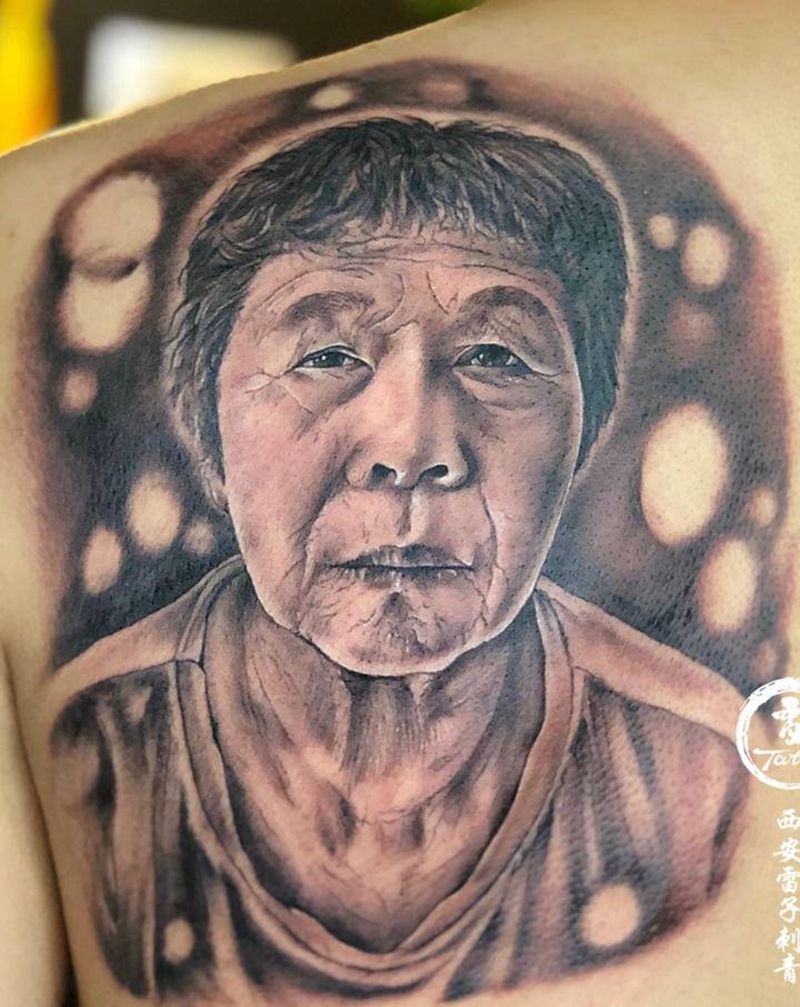 人物肖像纹身图片_肩部肖像写实纹身图案