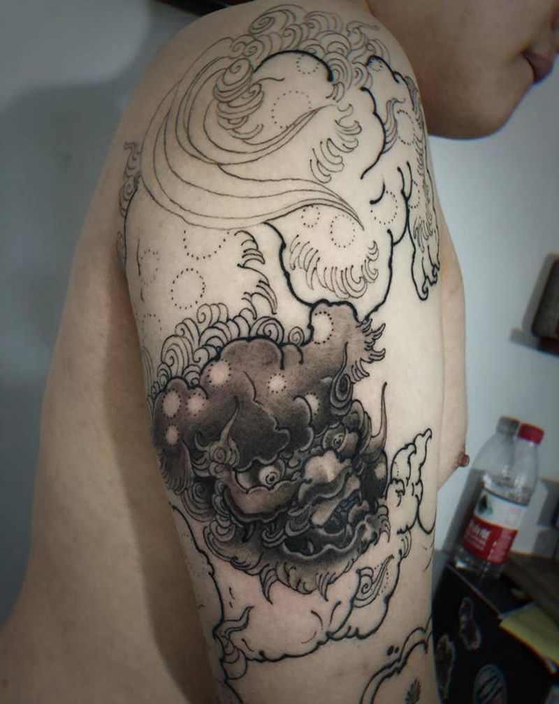 唐狮子大臂未完纹身图片_手臂手部新传统纹身图案