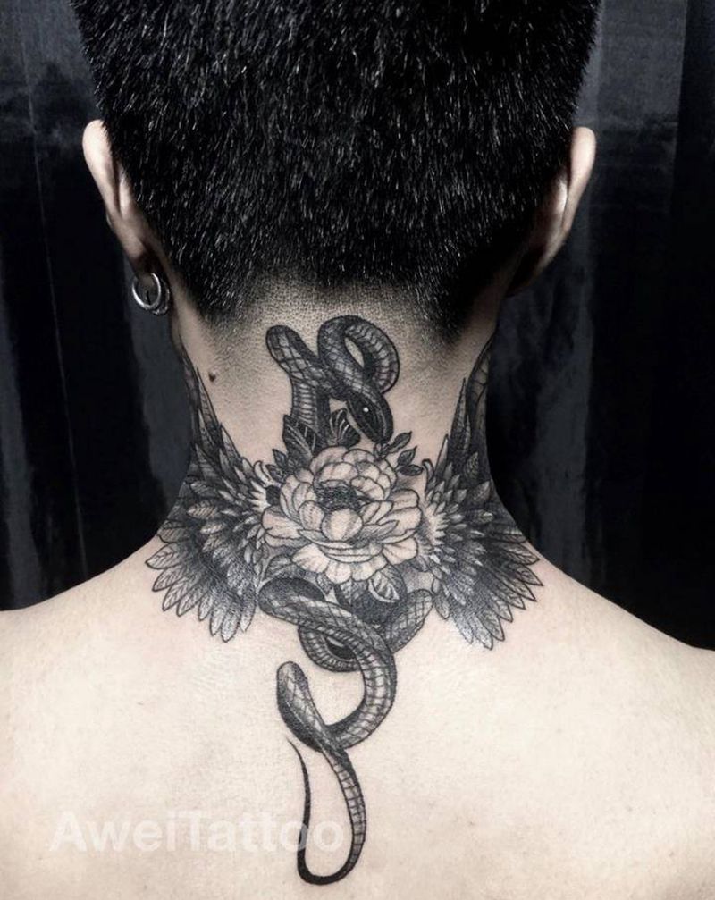 带翅膀的蛇纹身图片_肩部颈部几何点刺蛇翅膀花纹身图案