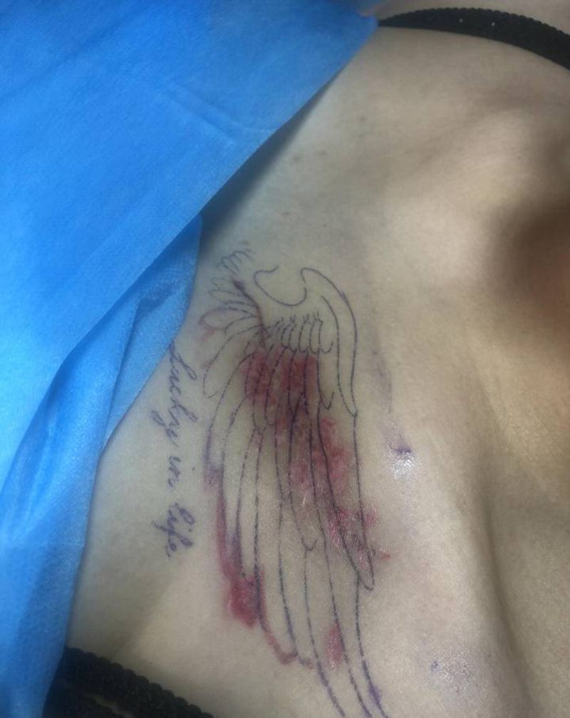 翅膀遮盖纹身图片_手臂腿部水彩水墨纹身图案