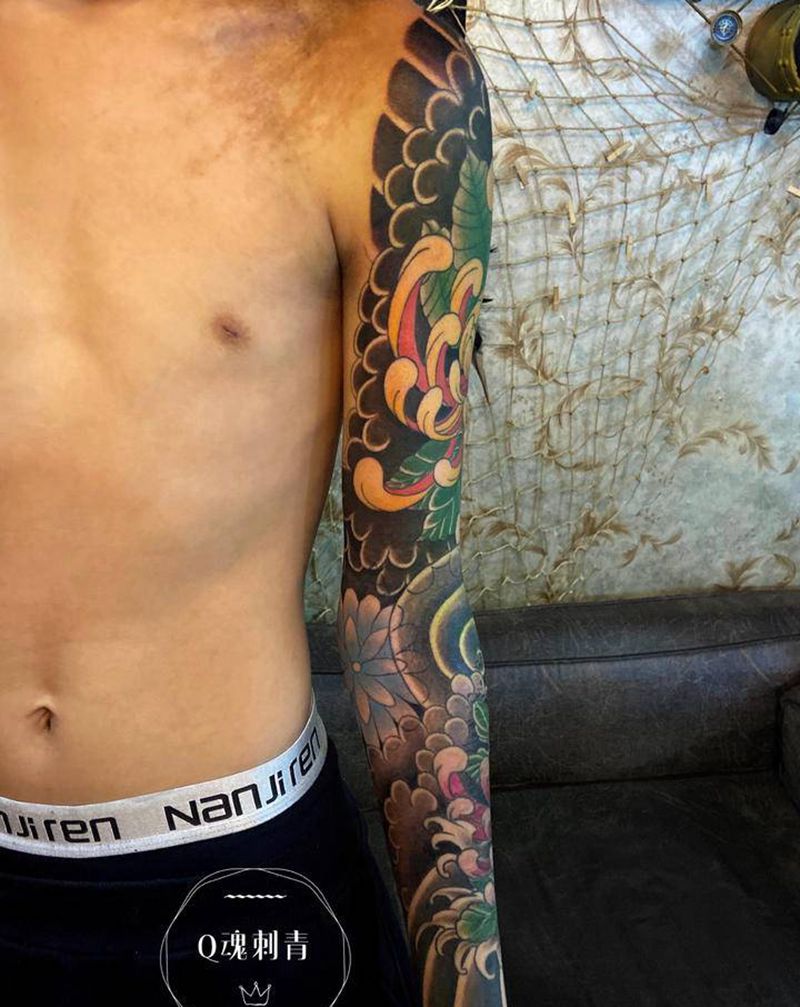 传统花臂纹身图片_手臂老传统纹身图案