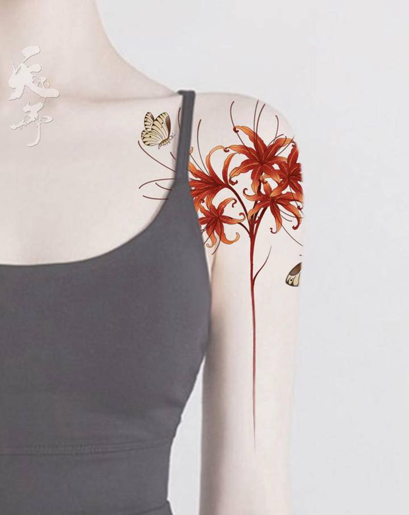 西安纹身｜西安tattoo纹身图片_肩部背部彼岸花蝴蝶纹身图案