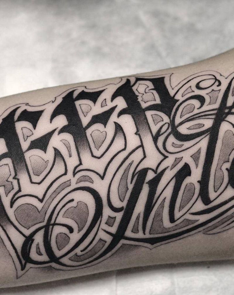 西安天予刺青花体字纹身作品纹身图片_手臂花体字纹身图案