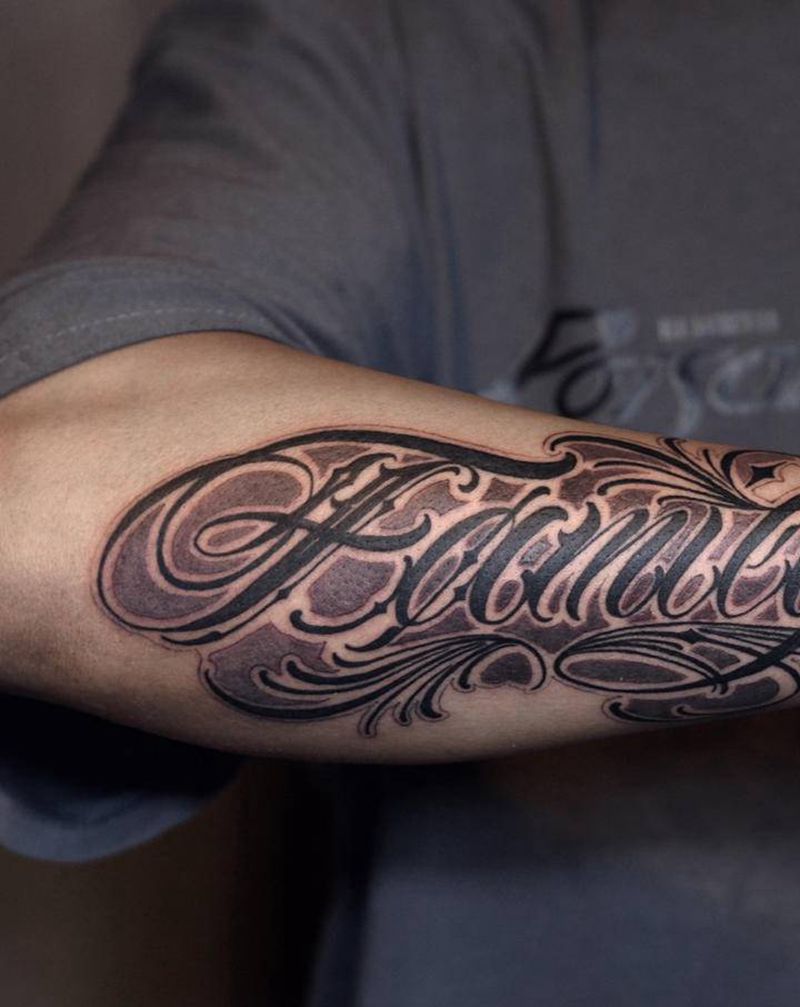 西安天予刺青花体字纹身作品纹身图片_手臂花体字纹身图案