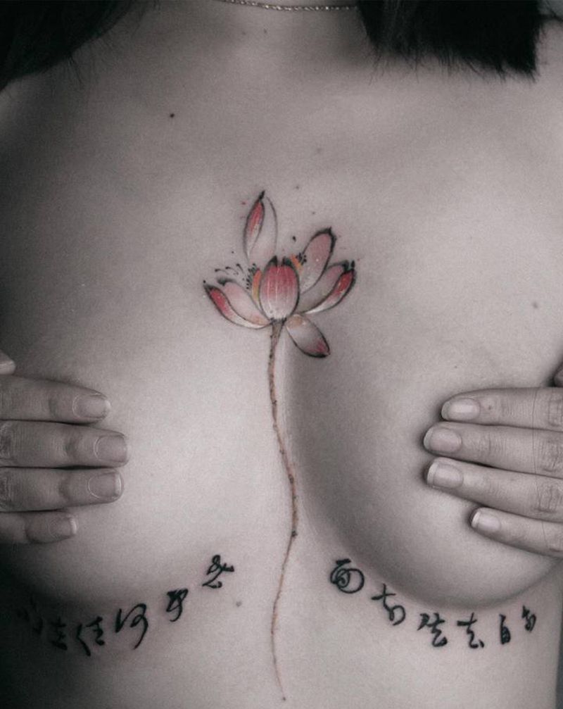 自由纹身图片_胸部水墨纹身图案