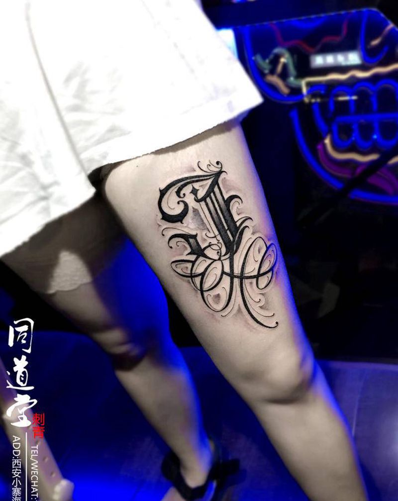 花体字纹身纹身图片_腿部花体字Old School纹身图案