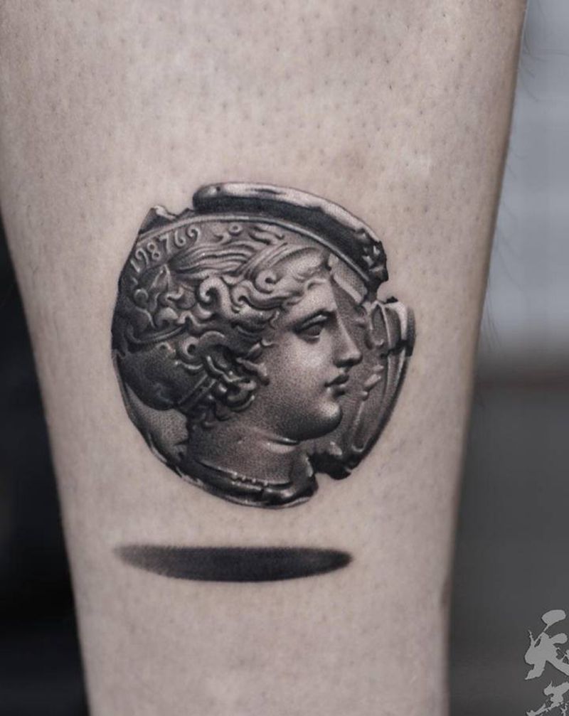 写实小图纹身图片_腿部欧美写实纹身图案