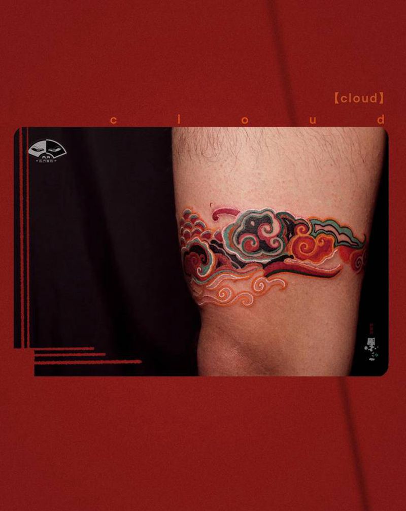 云纹身图片_腿部水彩纹身图案
